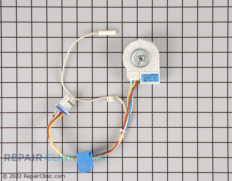 Refrigerator evaporator fan motor with thermistor in the harness. If the freezer is cold, but the refrigerator is warm check if the evaporator fans motor is running and circulating air between the refrigerator and freezer.