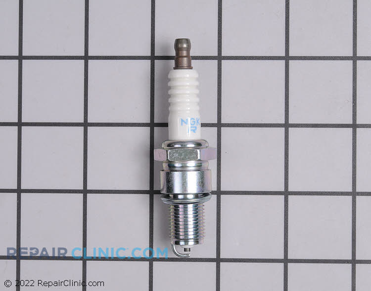 NGK spark plug. The spark plug ignites the fuel and air mixture in the cylinder to power the engine. If the spark plug is burnt, fouled or damaged the engine may not start or may run rough.
