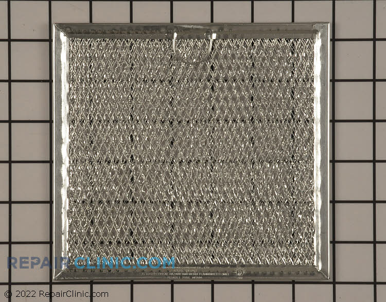 Microwave grease filter. Measures approximately 6 1/4 inch x 7 inch